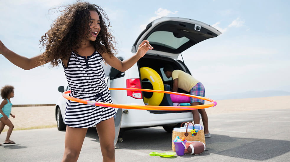 10 reasons to take a family road trip across America girl hula hooping